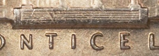 Close-up of 1948 nickel Monticello reverse showing Full Steps with five unbroken horizontal step lines at the base of the building